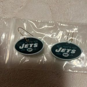 Jets earrings. Never worn still in bag